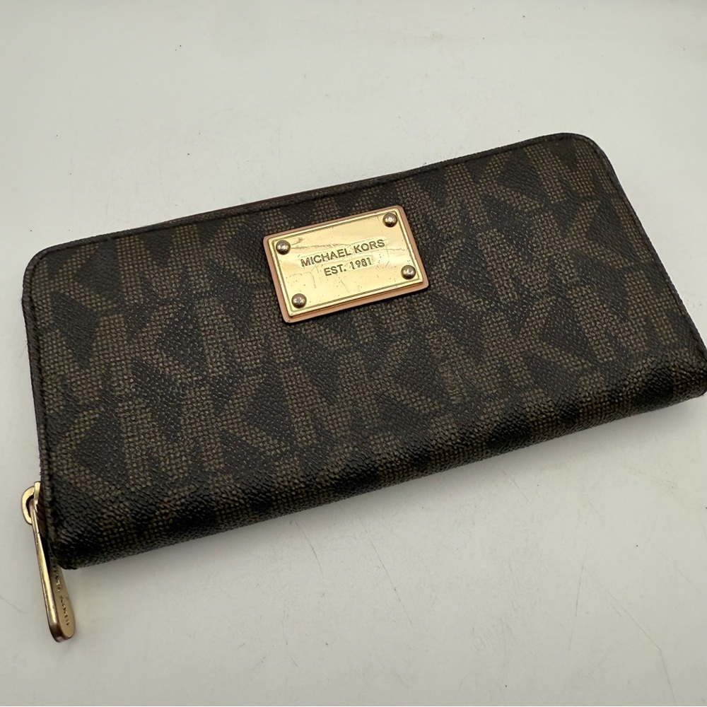 Michael Kors Black and Gold Logo Plaque